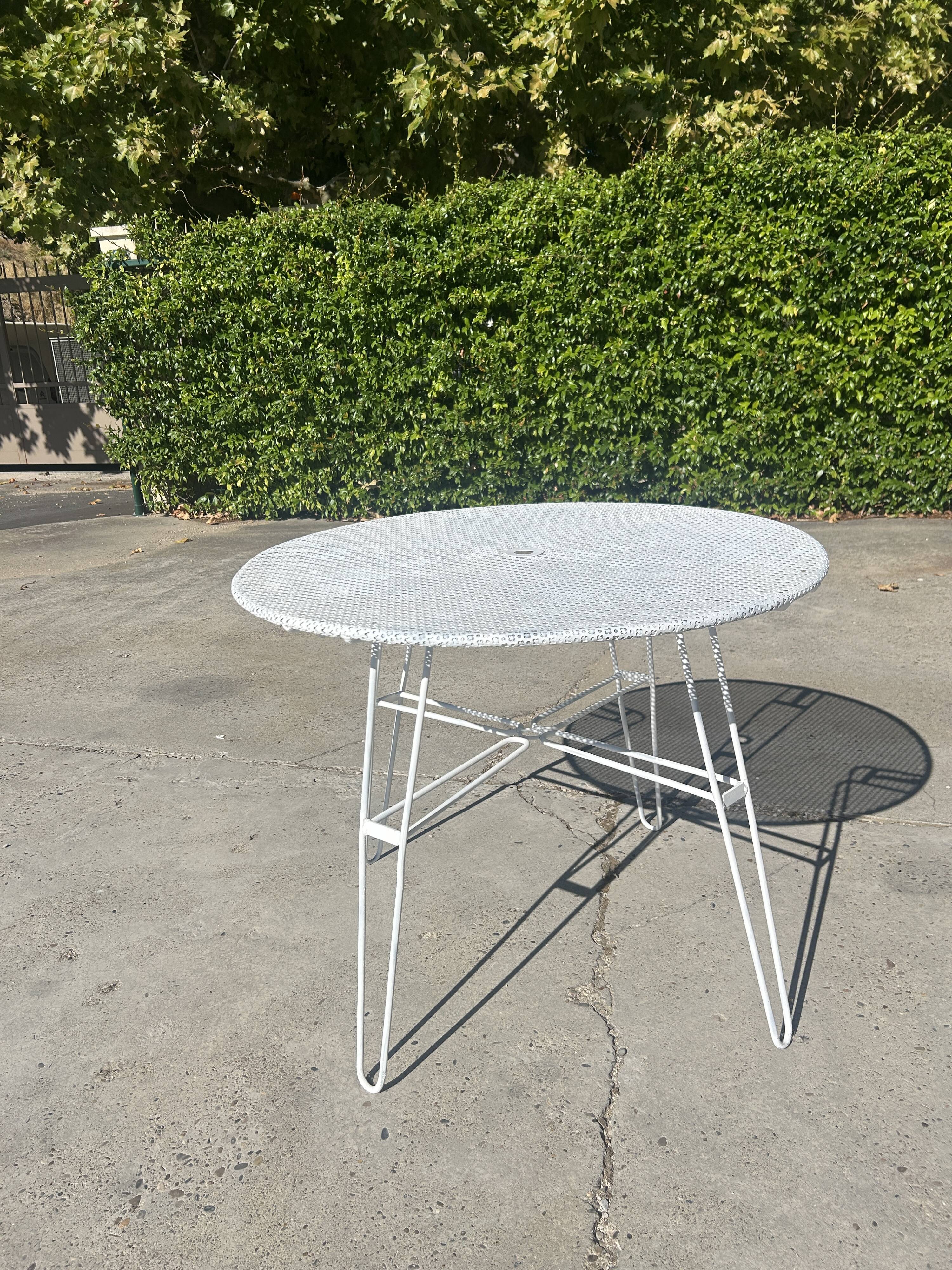 Garden table attributed to Mathieu Mategot from the 1950s.