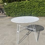 Garden table attributed to Mathieu Mategot from the 1950s.