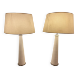 Pair of modernist stone and bronze lamps.