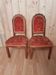 Pair of red velvet chairs