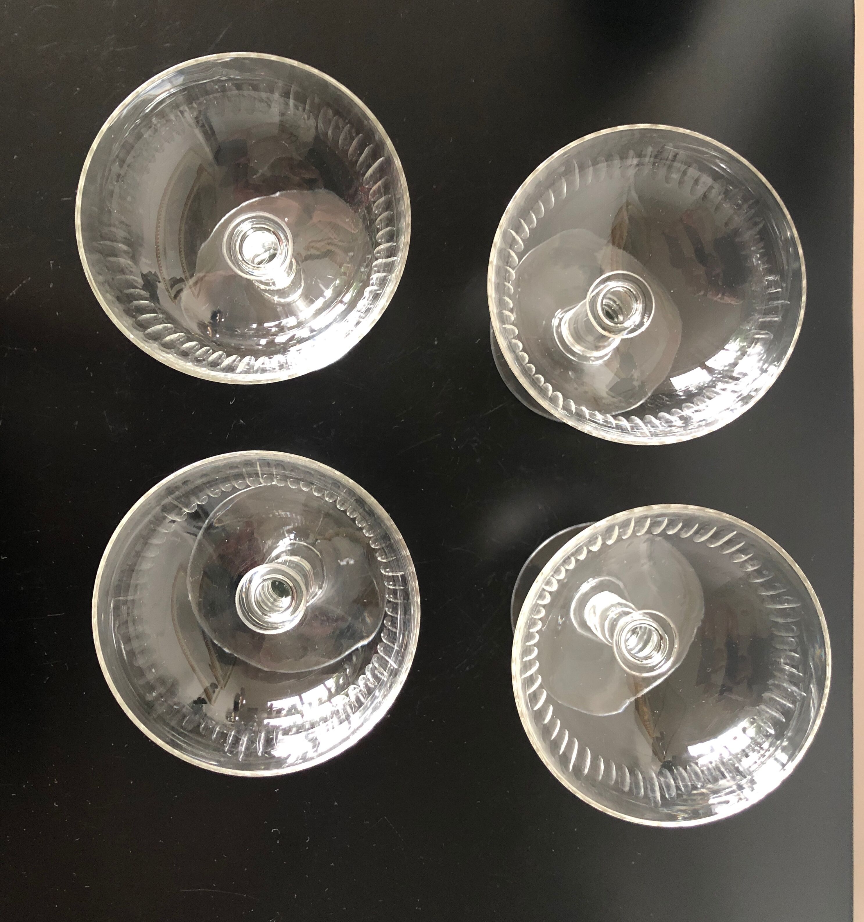 4 glasses of carved crystal champagne