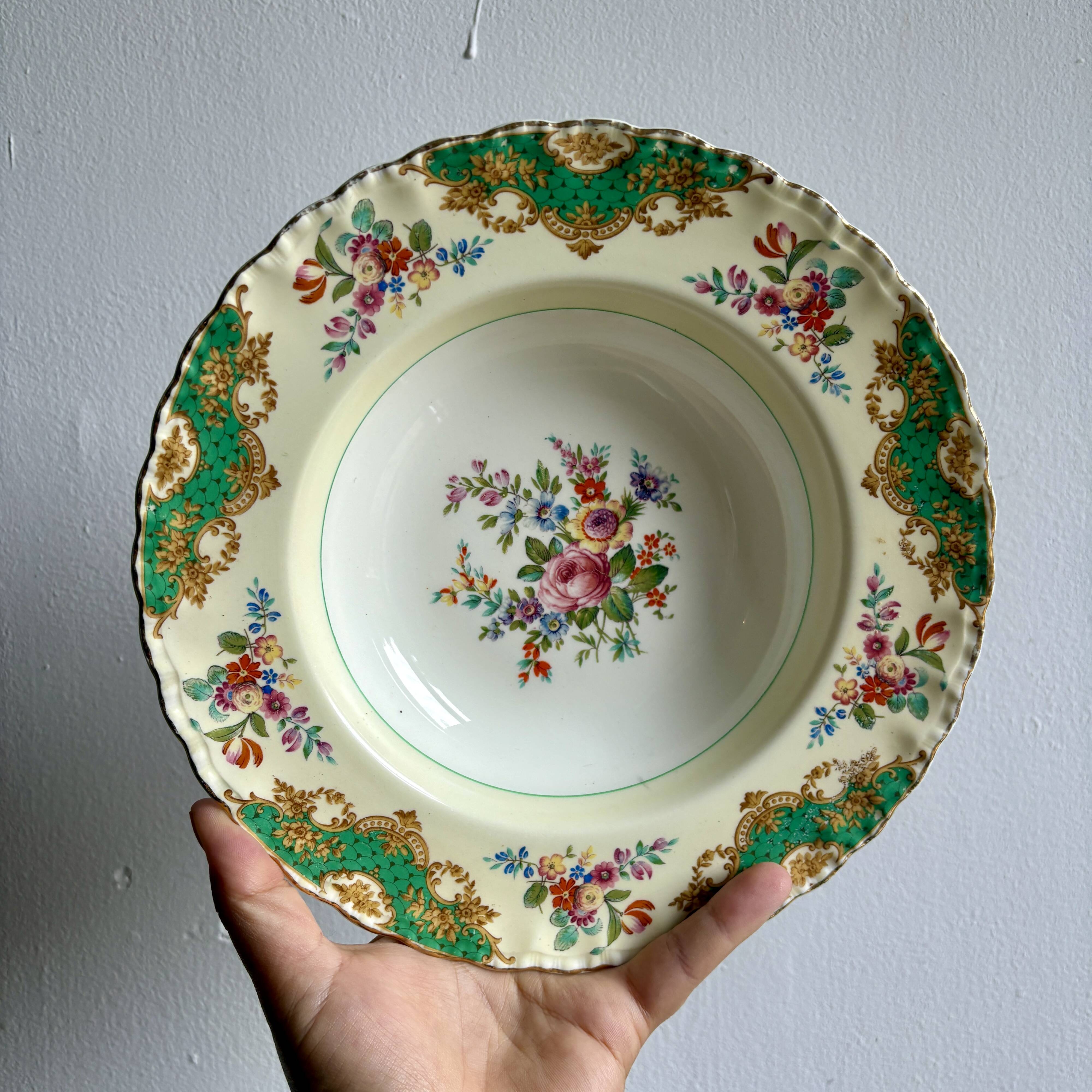 Set of 6 mismatched antique deep plates.