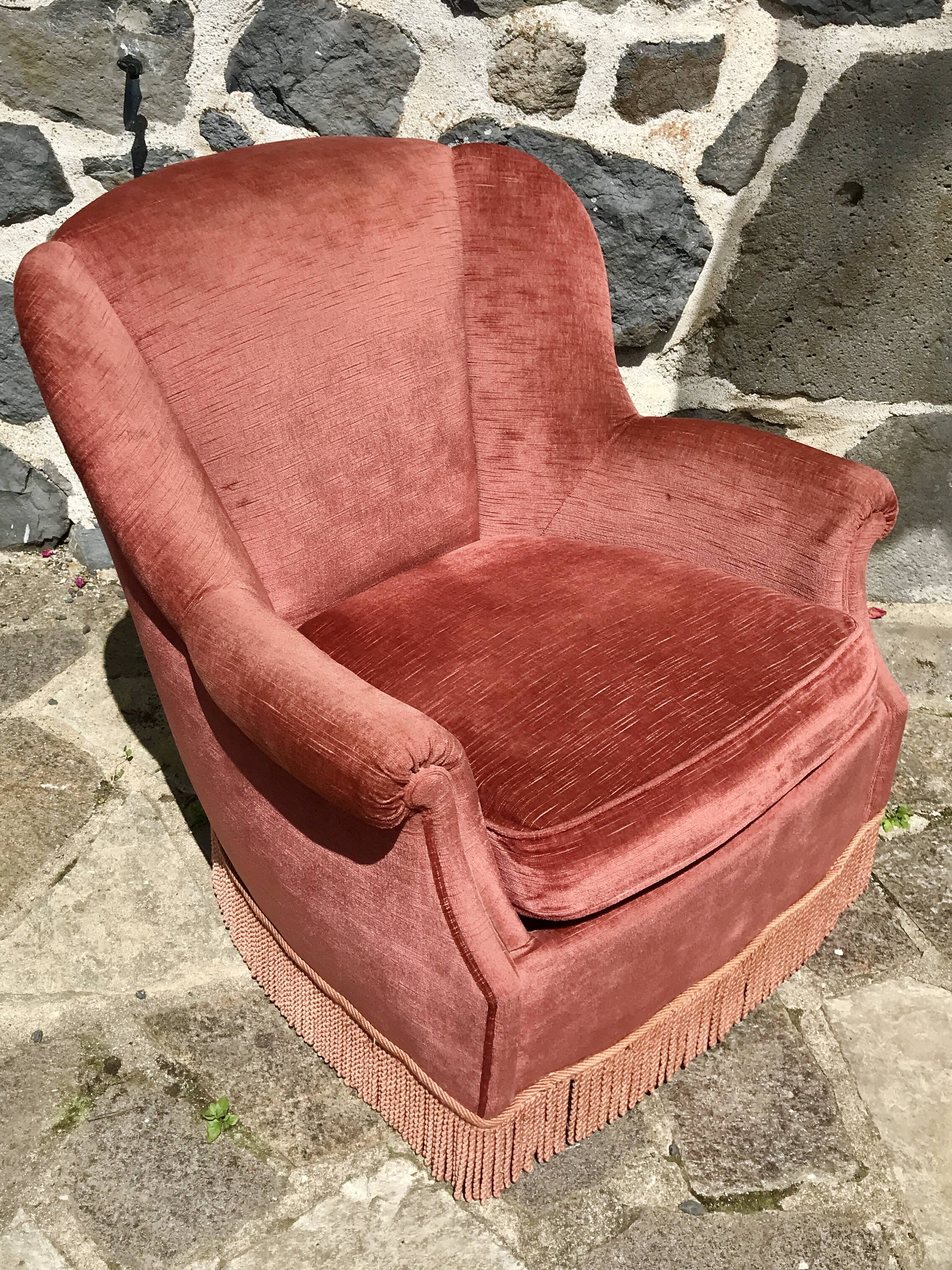 Vintage pink velvet armchair with fringes