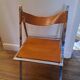 2 Chromed metal and leather folding chairs. 70s. Fontoni & Geraci