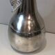 Silver-plated metal and plastic pear-shaped ice bucket.