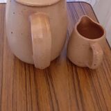 Coffee maker milk jar in sandstone