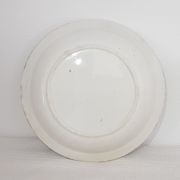 Plat creux en faïence de St Amand et Hamage modèle Primevère, terre de fer.