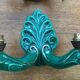 Former pair of art deco green ceramic wall sconces