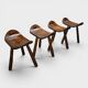 Ensemble de 4 tabourets brutalistes en bois massif