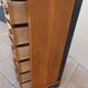 Louis XVI style chest of drawers in wood and cherry veneer.