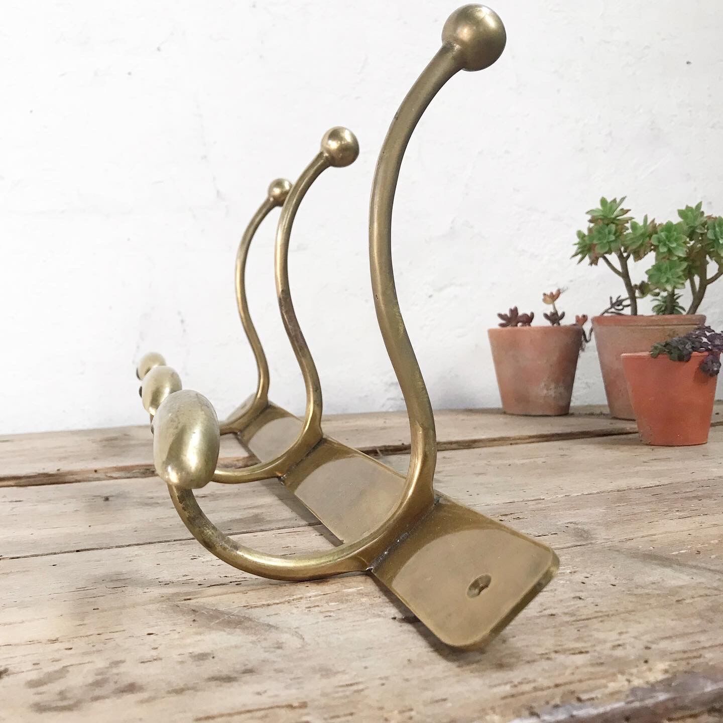 Brass wall coat rack