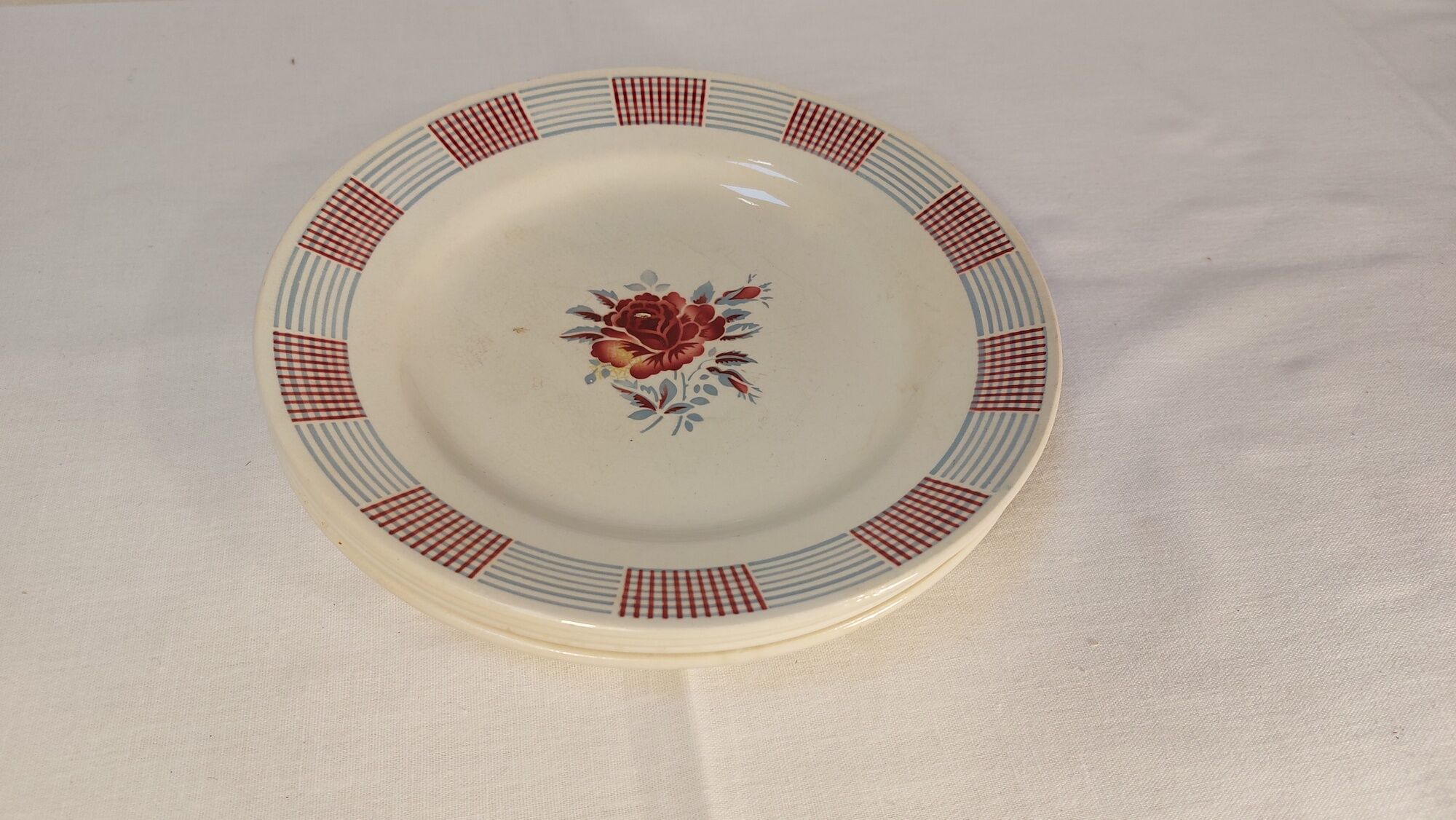 Set of 4 old flat plates from the earthenware factories of St Amand