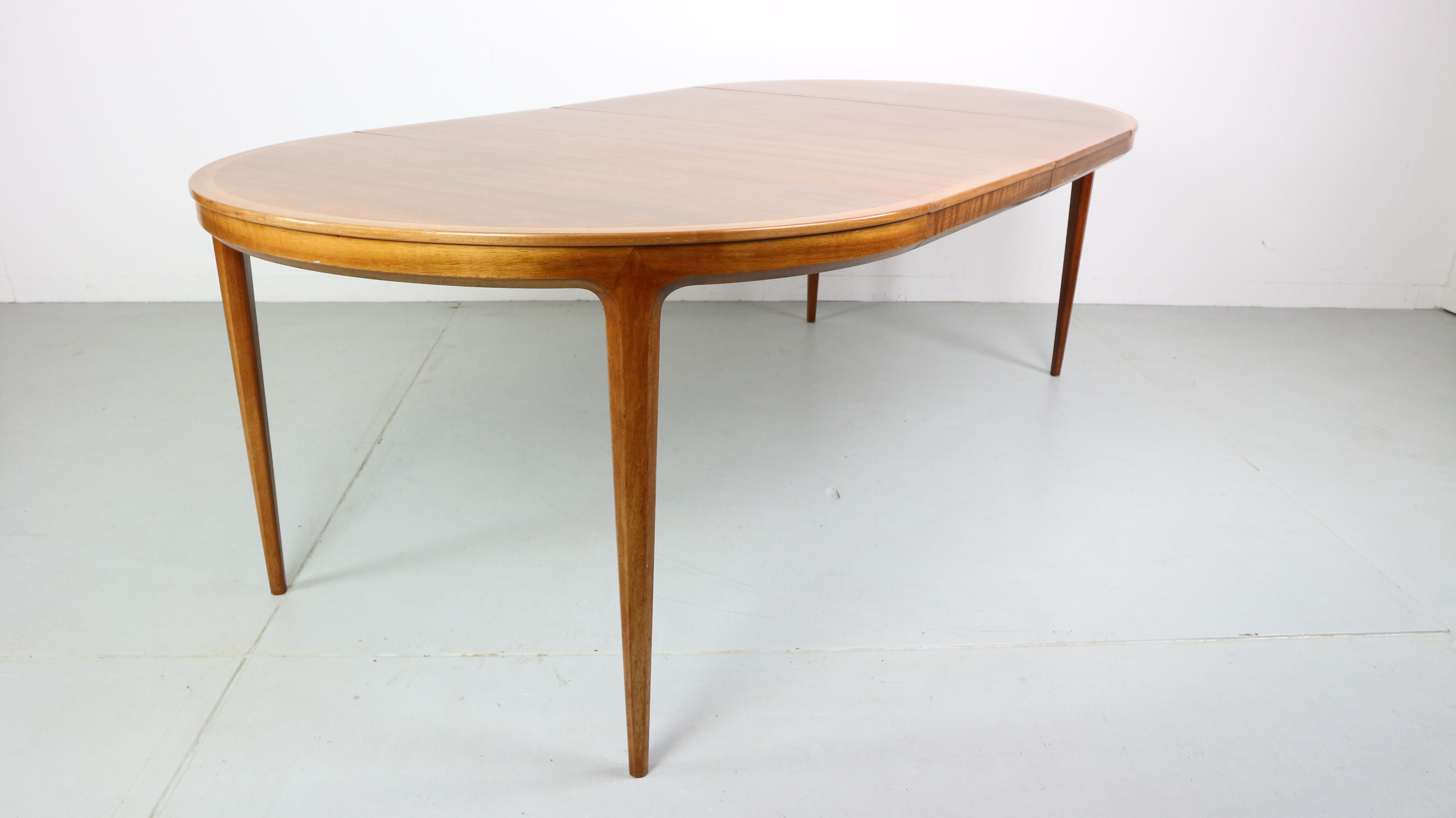 Swedish walnut dining table by B. Fridhagen for Bodafors, 1960s