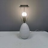 Older ceramic table lamp with beautiful details.