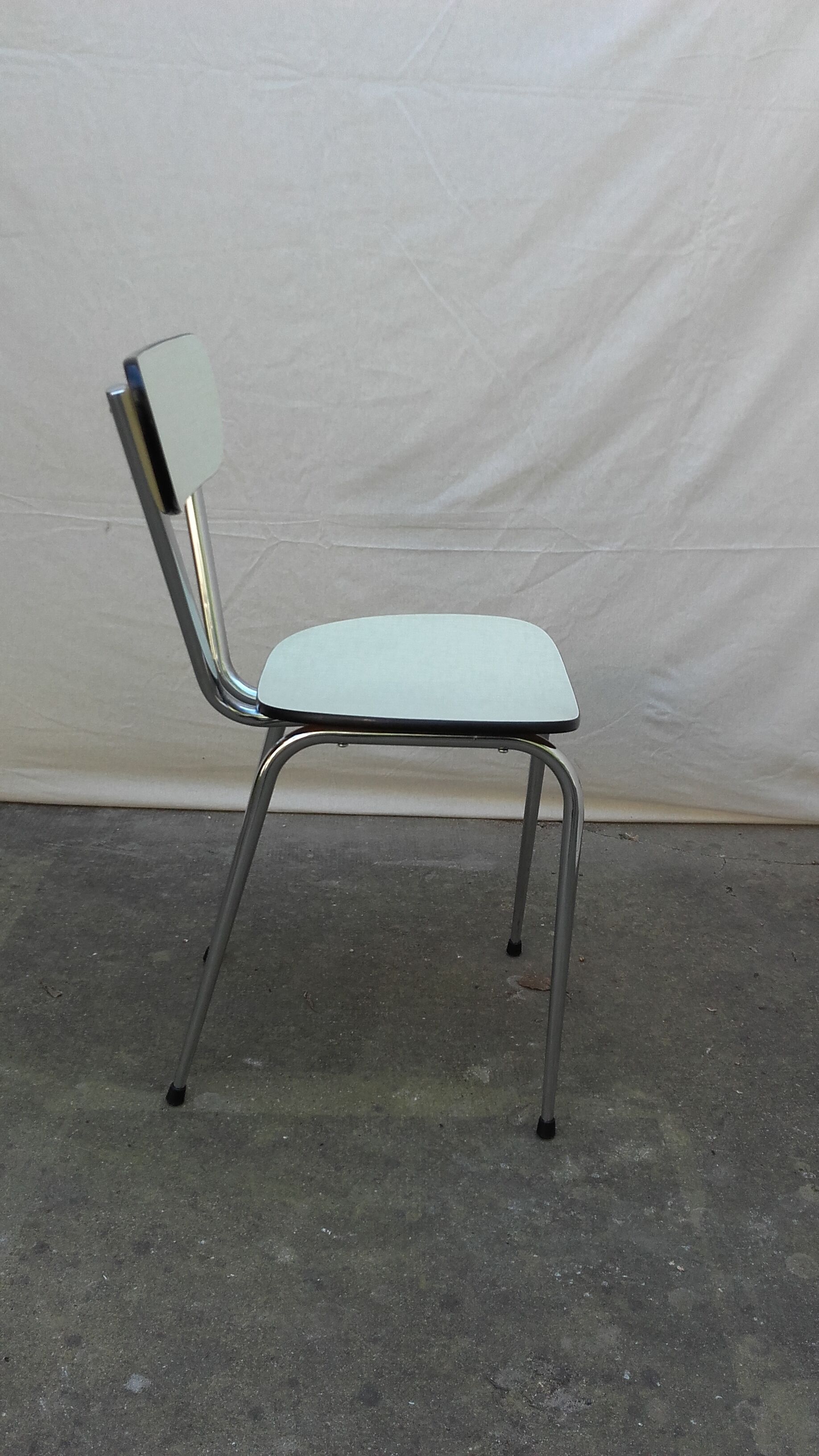 Six ivory formica chairs