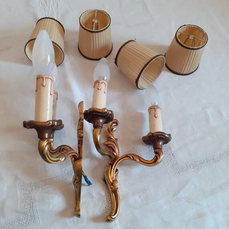 Pair of two-armed wall lights in gilded bronze, Louis XV style, by Lucien Gau.