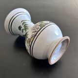 White vase with plant decoration