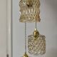 Triple antique globe pendant light in amber glass