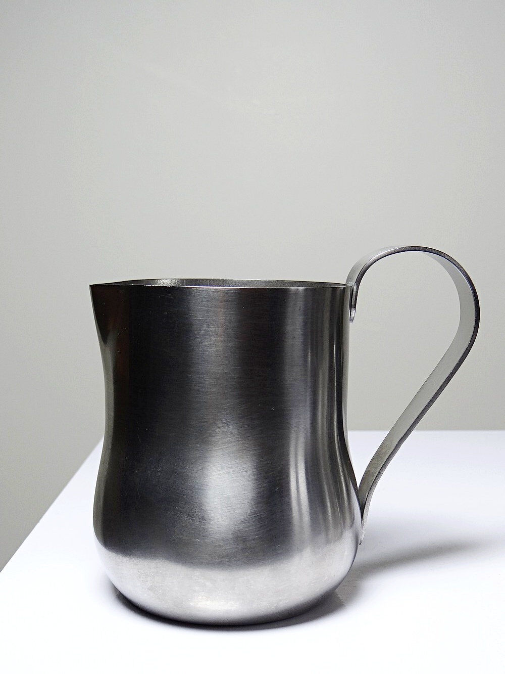 Set of 4 vintage bar measures in brushed stainless steel from the 60s-70s.