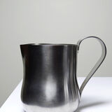 Set of 4 vintage bar measures in brushed stainless steel from the 60s-70s.