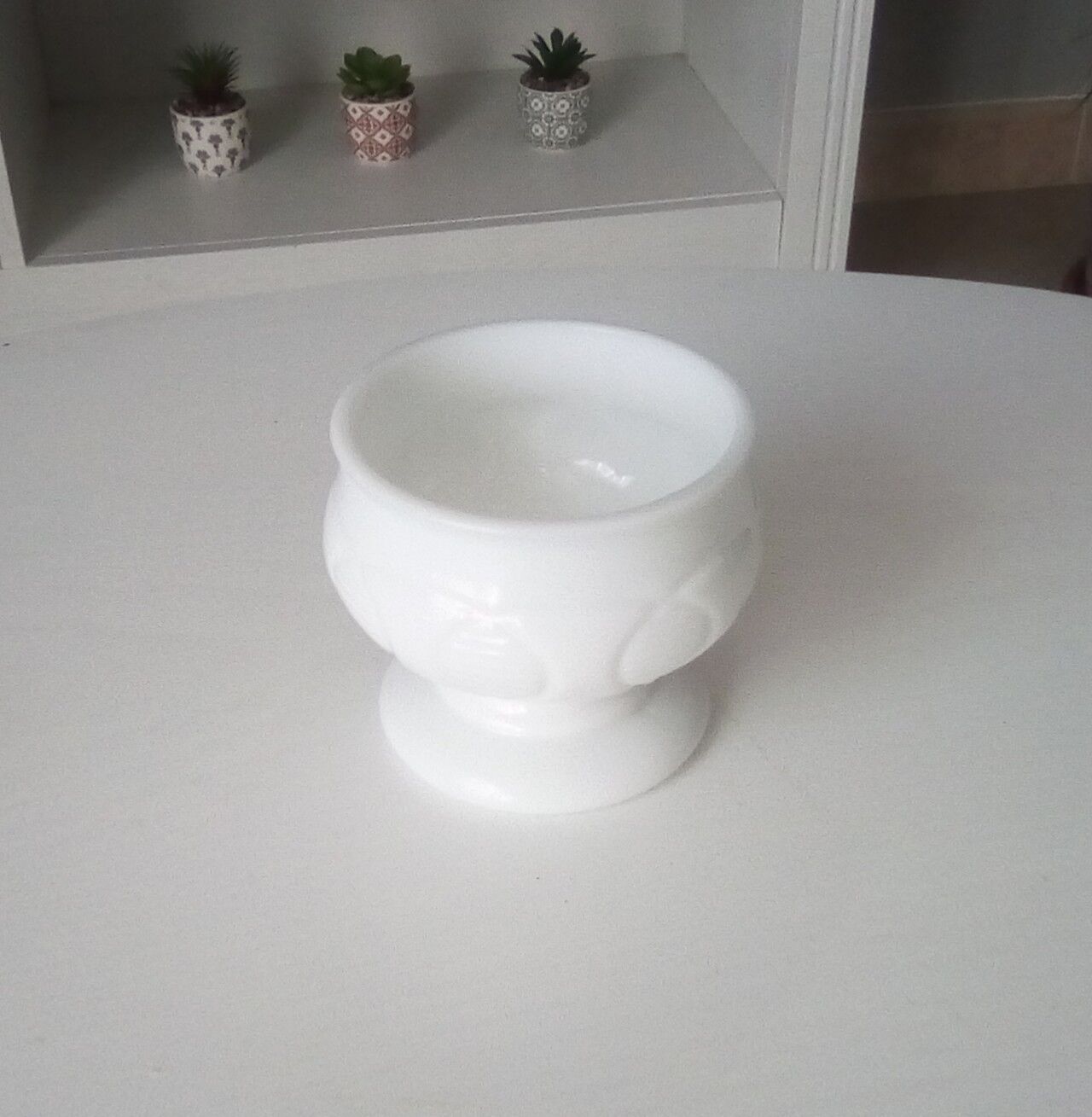 Old-footed cup in white opaline