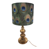 Brass lamp with a peacock feather lampshade
