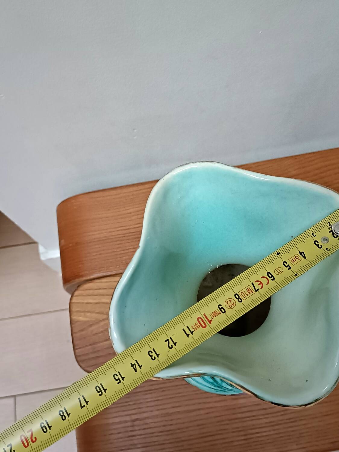 Vallauris vase flowers on black background