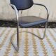 Vintage metal tubular sled chair leather