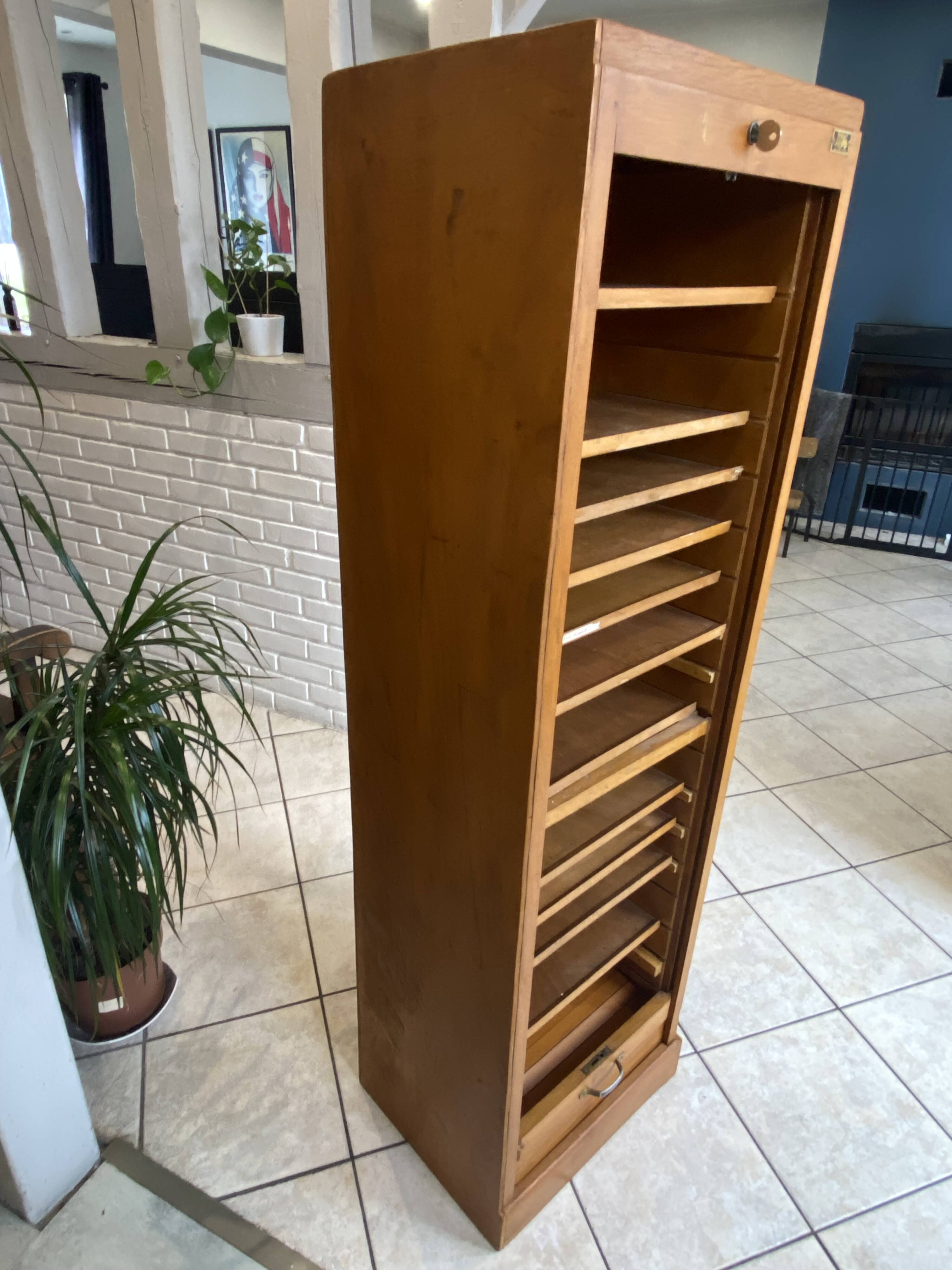 1950s oak office storage cabinet with curtains.