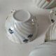 coffee pot, cup and saucers