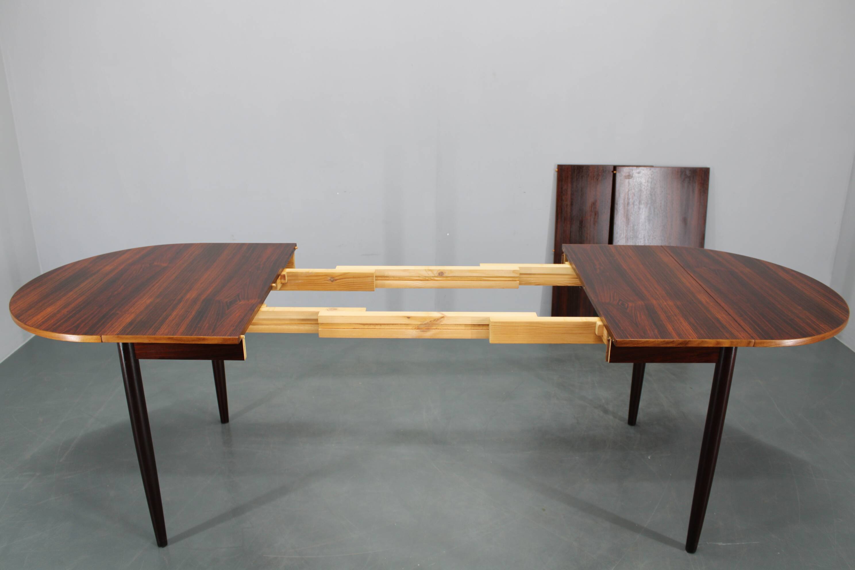 1960s Danish extendable palisander dining table, 4 leaves, restored