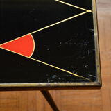 Brass and glass coffee table with compass feet