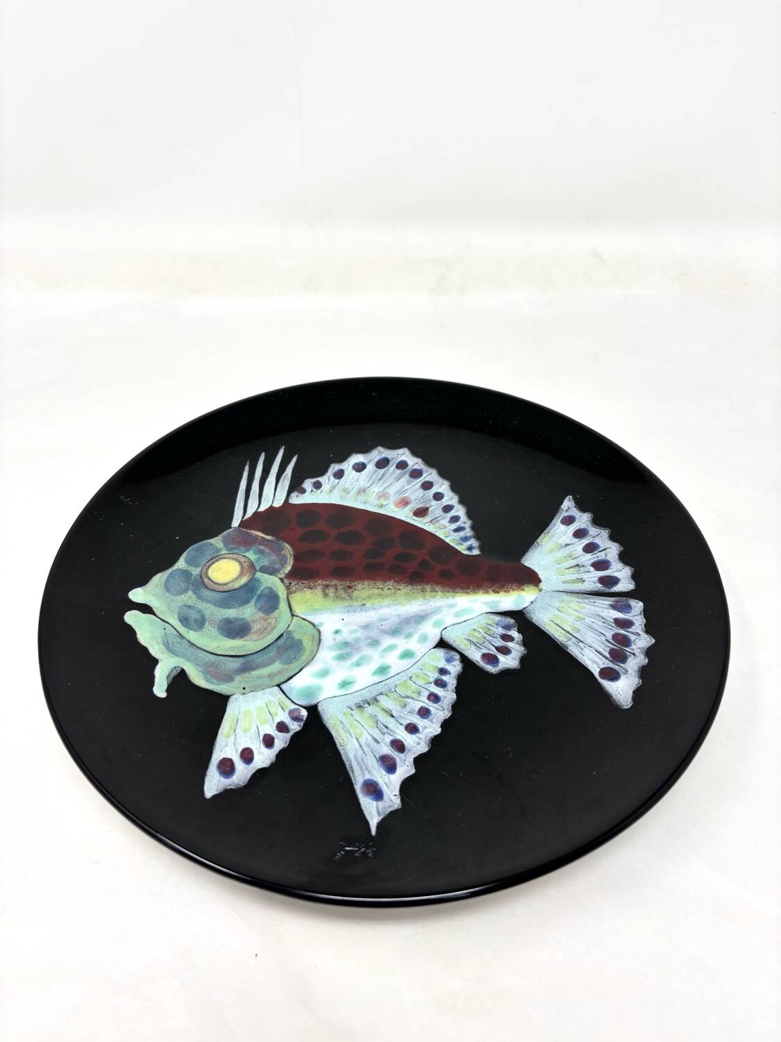 Ceramic plate with fish design from Louvain