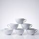 Set of 6 Bernardaud Limoges Louvre model white porcelain cups.