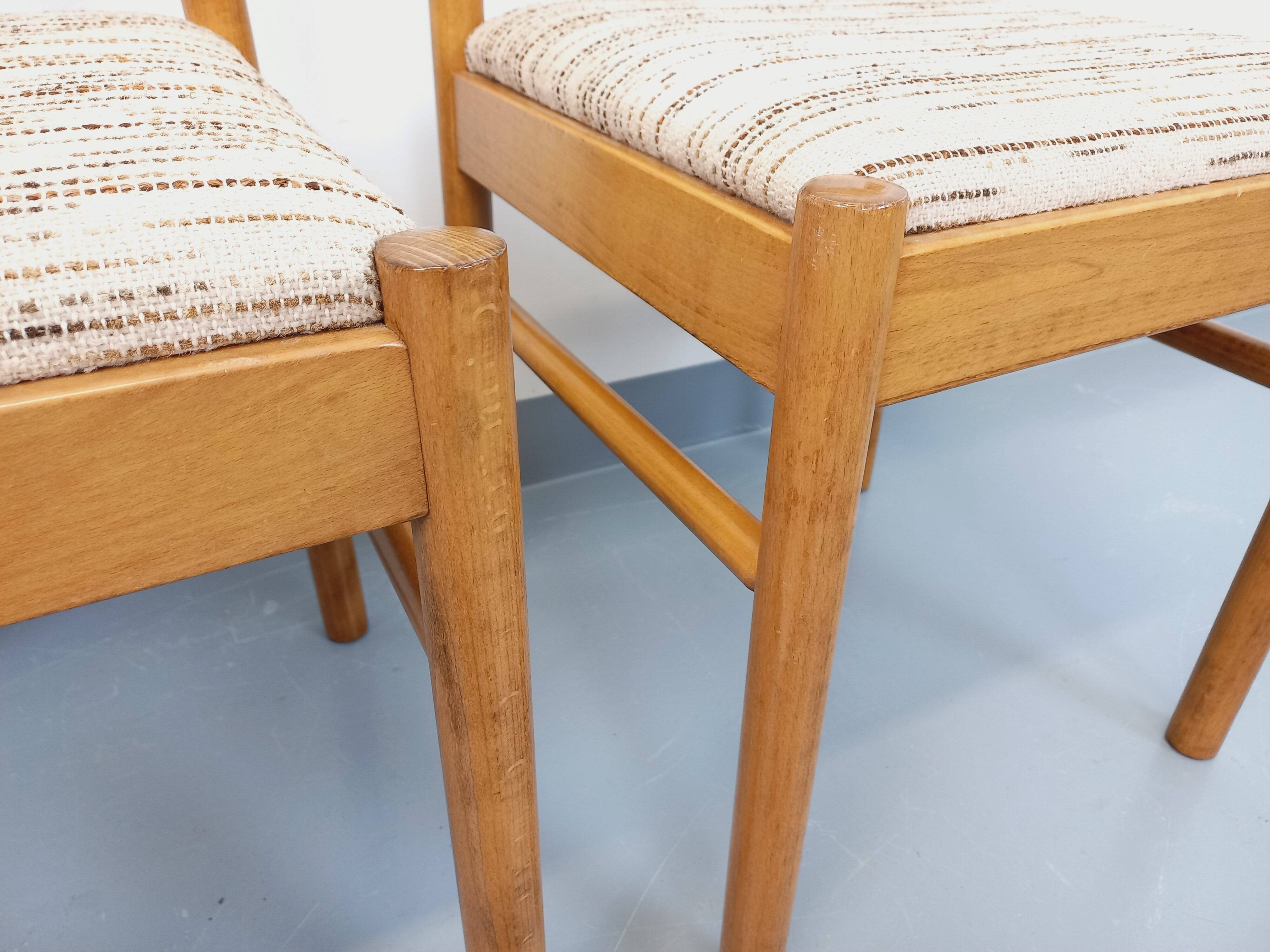 Pair of vintage Baumann chairs in wood and fabric from the 70s