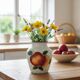 White Ceramic Vase with Peach and Leaf Motifs