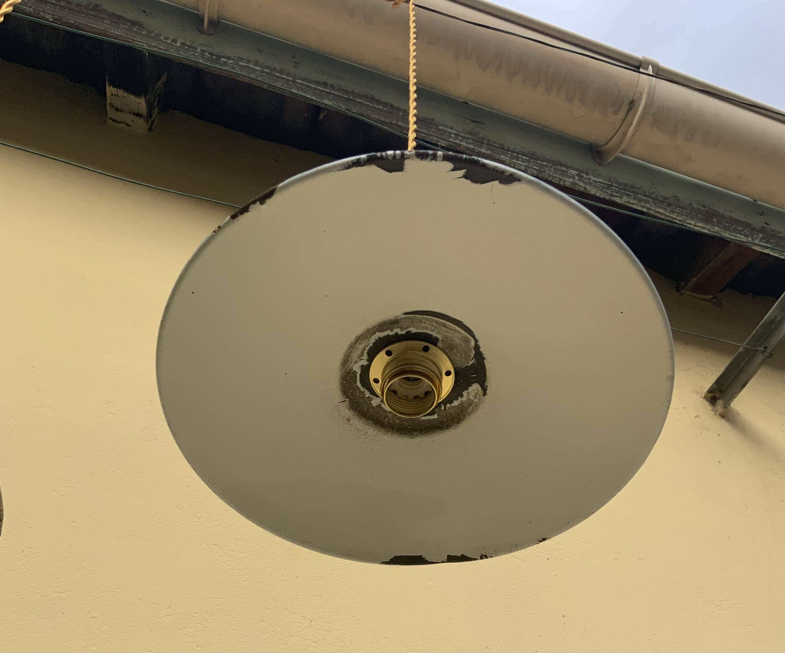 Vintage industrial enameled sheet metal pendant lights with golden wires, old green and white lampshade