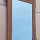 Louis XVI mirror in carved wood, 19th century.