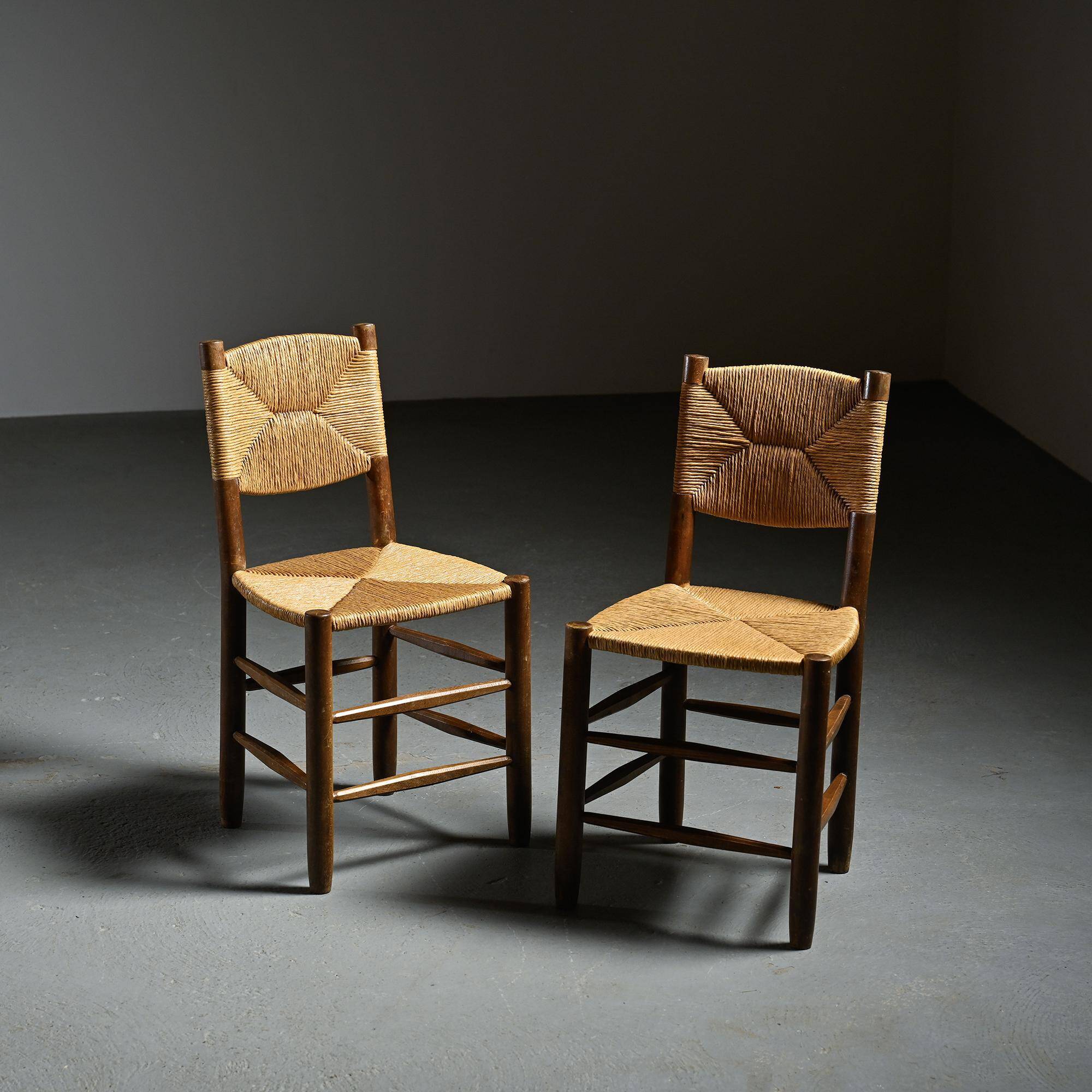 Paire de chaises modèle Bauche par Charlotte Perriand, circa 1950