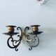 Old wall candle holder in golden brass
