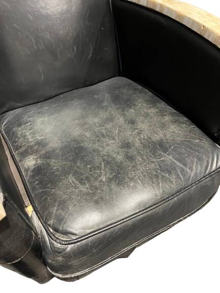 Pair of leather armchairs with marquetry armrests