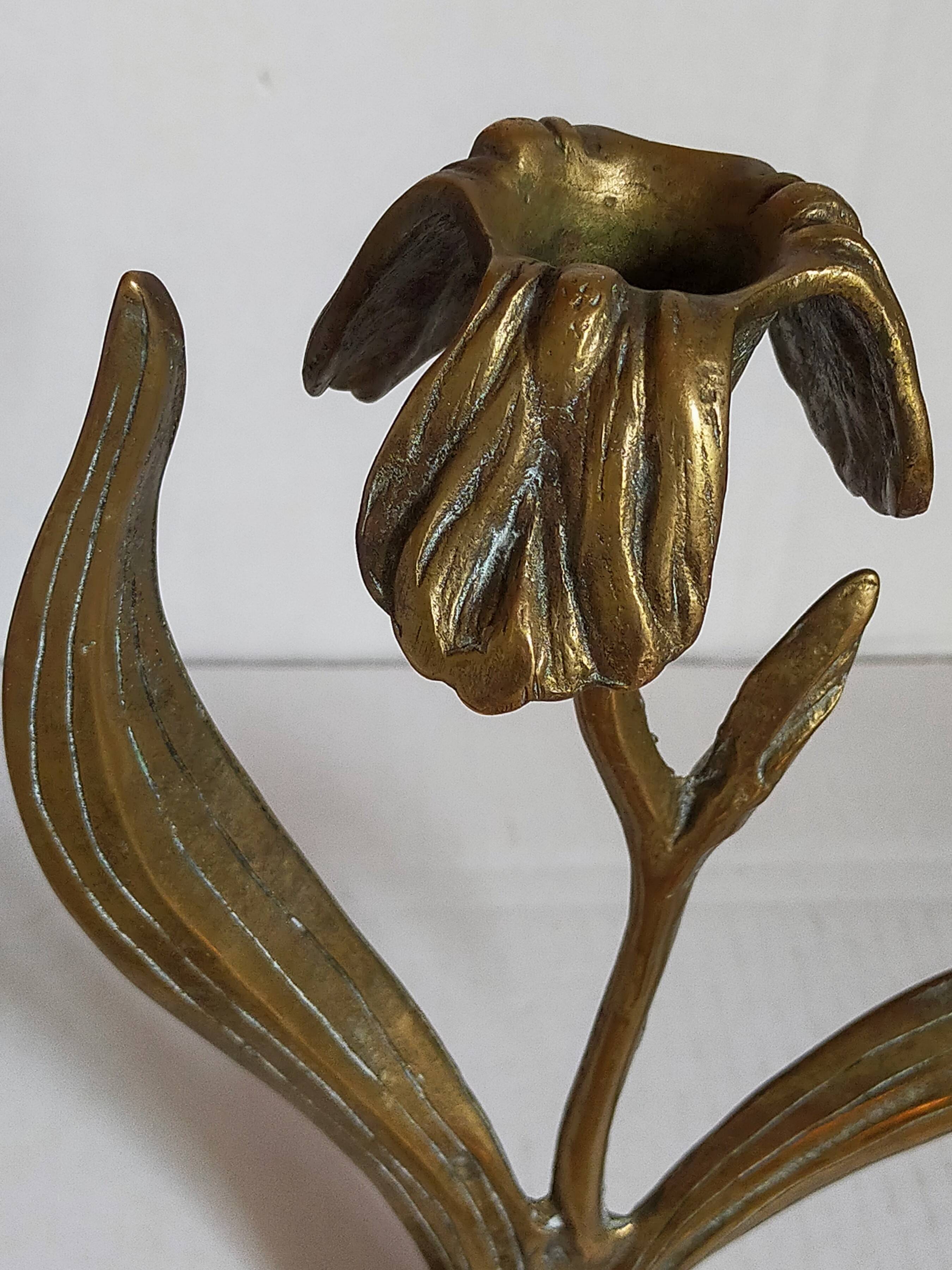 Old iris flower candle holder in solid brass