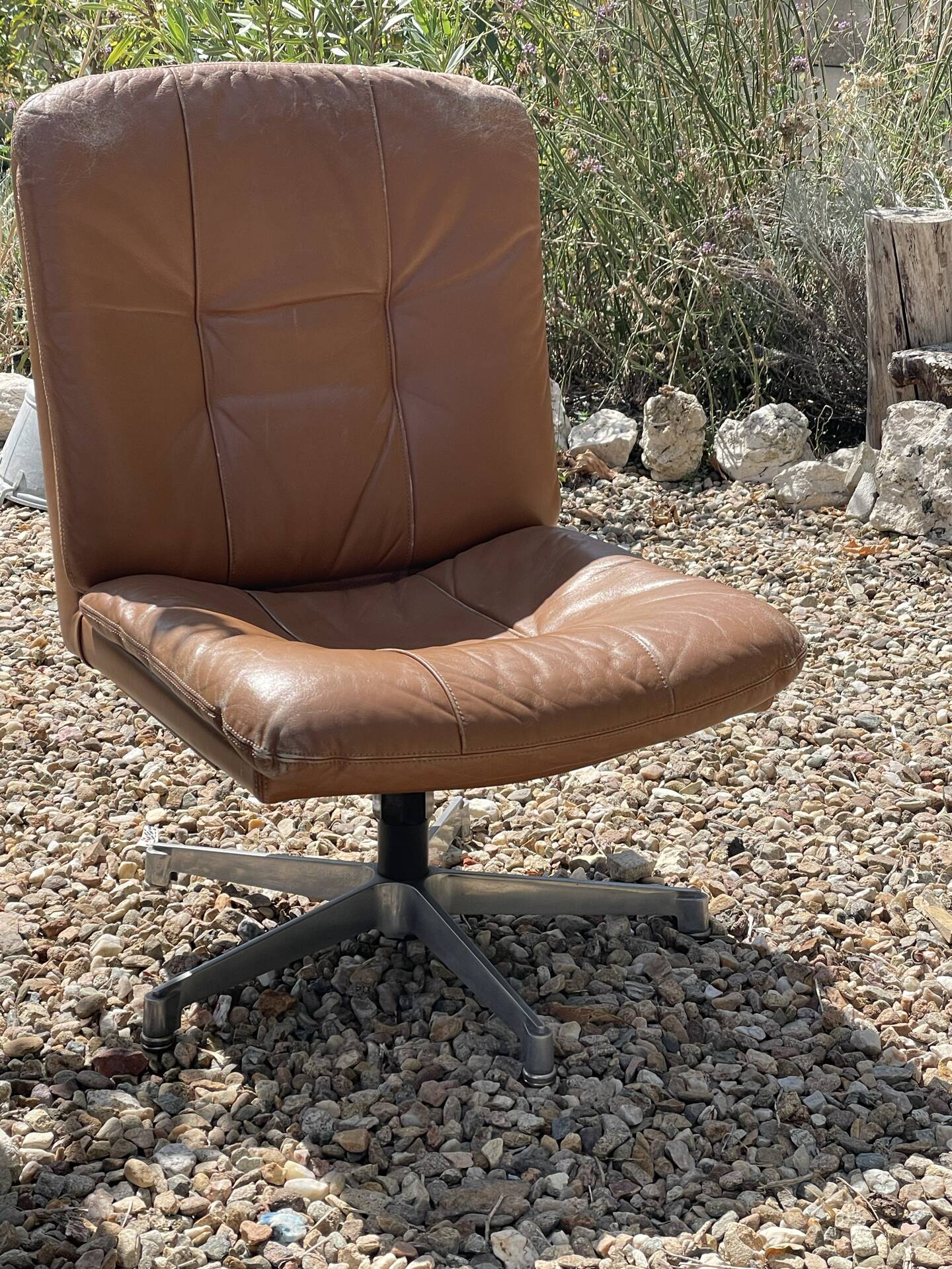 Pair of swivel armchairs in cognac leather – 1970s