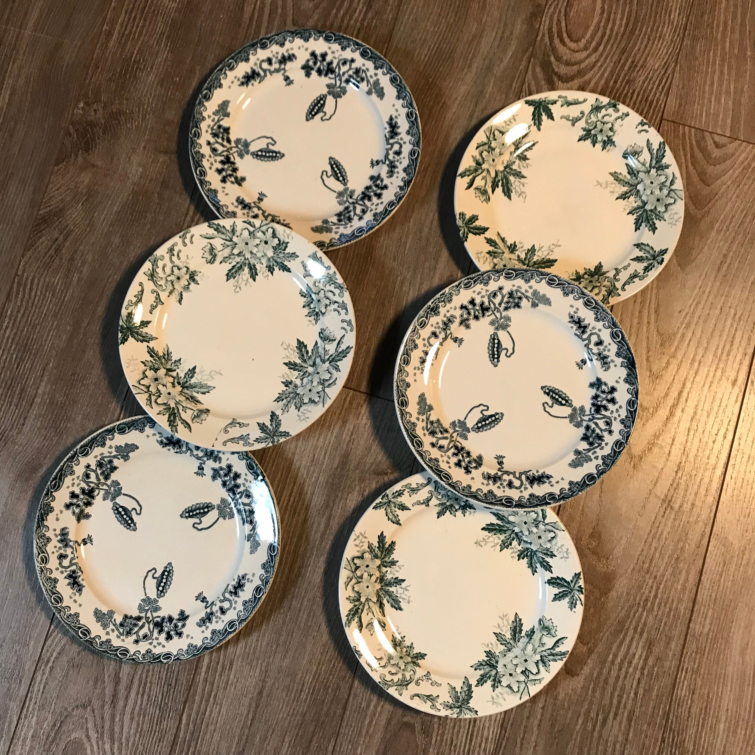 6 mismatched iron land dessert plates