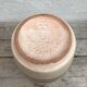 Antique beige ceramic vase with decorative painting
