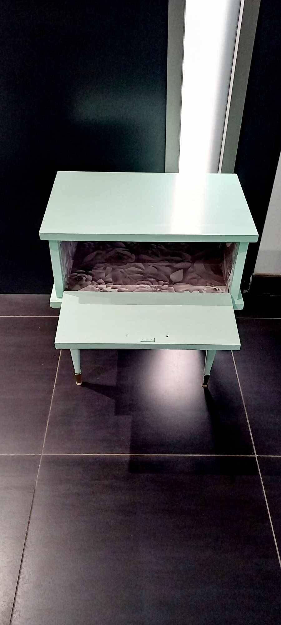 Vintage bedside table with compass feet
