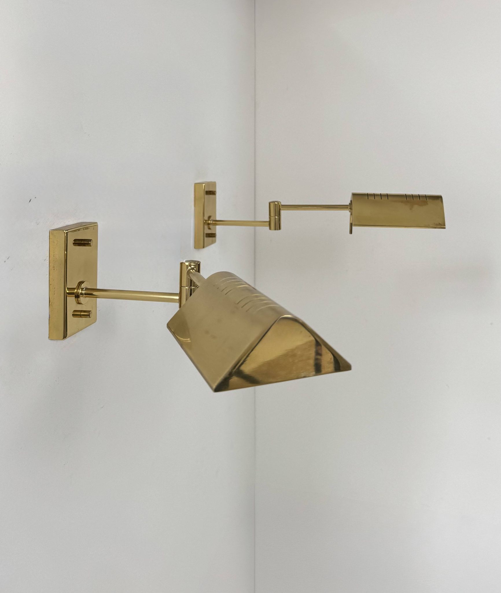 Pair of adjustable vintage wall lights, brass, France, 1970.