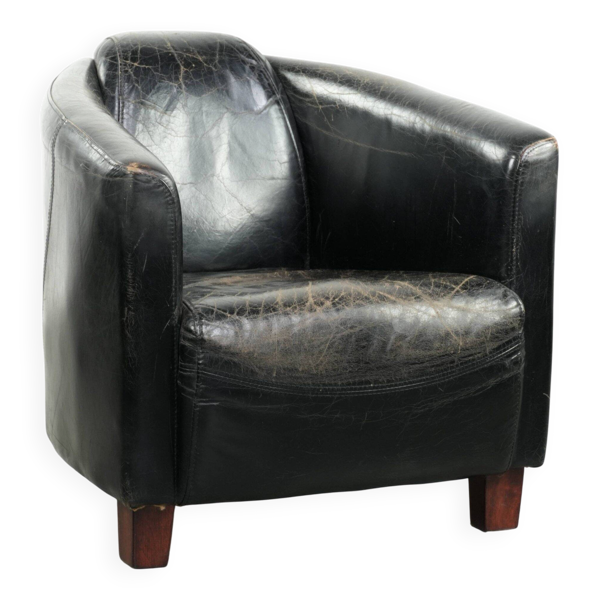 Fauteuil aviateur en cuir de vachette noir vintage robuste avec une riche patine.