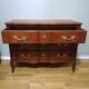 Commode arbalète trois tiroirs en merisier