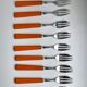 Set of 12 orange dessert forks in Bakelite and Tinplate 60s-70s